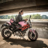 Ducati Monster 795 màu hồng bên Biker nữ Hà Nội
