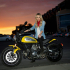 Nữ biker tóc vàng xinh đẹp đọ dáng cùng Ducati Scrambler
